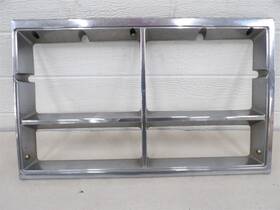 00555367 Oldsmobile 98 Ninety Eight 1977-1978 Lh Drivers Side Headlight Bezel Door Oem
