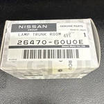 Nos Nissan Trunk Lamp 26470-60U0E. Fixed Price $18.00.
