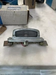 Nos 1972-1976? Ford Courier Truck Tag Light Bracket. Fixed Price $99.00.