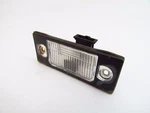 Trunk License Plate Lamp Lens Vw 99-05 Jetta Golf Gti Oem Genuine 1J5943021. Fixed Price $14.99.