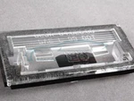 2X Genuine Bmw 51138244336 - Series License Plate Light Lens. Fixed Price $43.28.