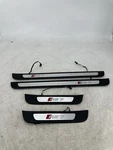 14-18 Audi RS7 Door Sill Scuff Trim Panel Set Illuminated Oem. Fixed Price $325.00.