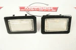 1986-1996 Corvette C4 Convertible Rear Cargo Area Lights With Bezels. Fixed Price $38.95.