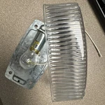 307-11 Optronics IL-21CS Clear Surface Lens & Bulb Mount Light, No Gasket/screws. Fixed Price $9.10.