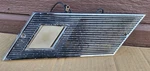 1965 Ford Galaxie 500 Chrome Left Rear Sail Panel Courtesy Light & Speaker Cover. Fixed Price $40.00.