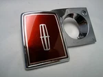 New Nos 1984 - 1986 Lincoln Mark Vii Deck Lid Trunk Keyhole Lock Emblem Cover. Fixed Price $85.00.