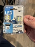 Pilot IL-1157W-15 White Led Car Brake Light Bulb Set, 12V 2PC (boxlitteldamage). Fixed Price $12.99.